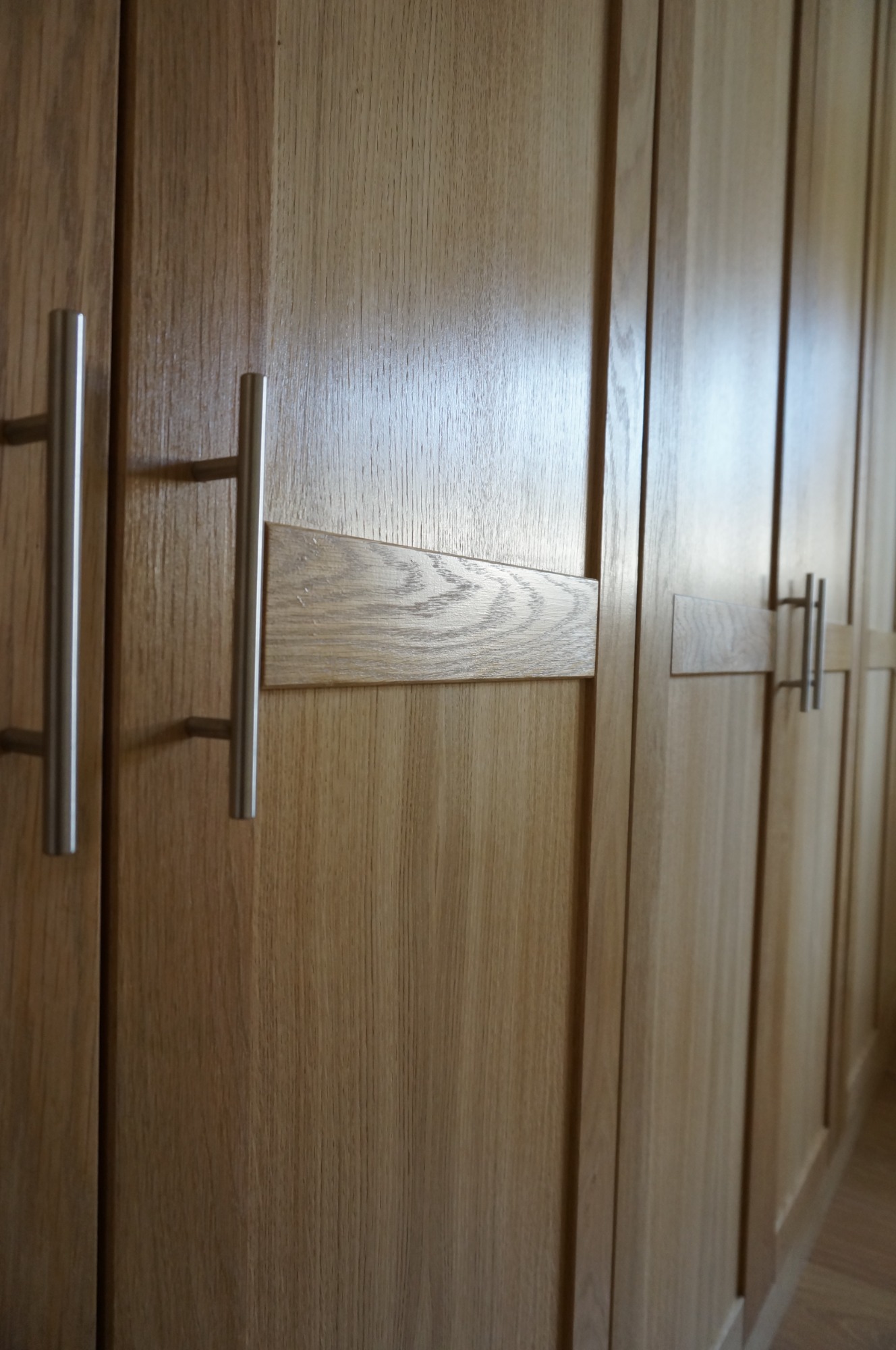 Detail of expert craftsmanship on bespoke oak furniture